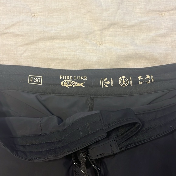 Lightly used black RFG quick dry board shorts. Size 30. - Picture 2 of 3